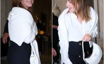 Emma Watson stuns at Milan Fashion Week with adorable four-legged date