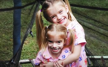 What These Identical Twins, One of Whom Is Over a Foot Taller, Look like at 25 — Photos from Their Childhood and Now