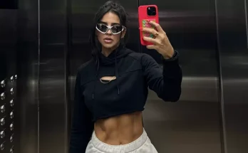 Influencer who filmed herself doing intense workout in the middle of plane aisle sparks online debate
