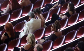 Jeff Goldblum says 'busted' after cameras caught what he was looking at on his phone at Oscars